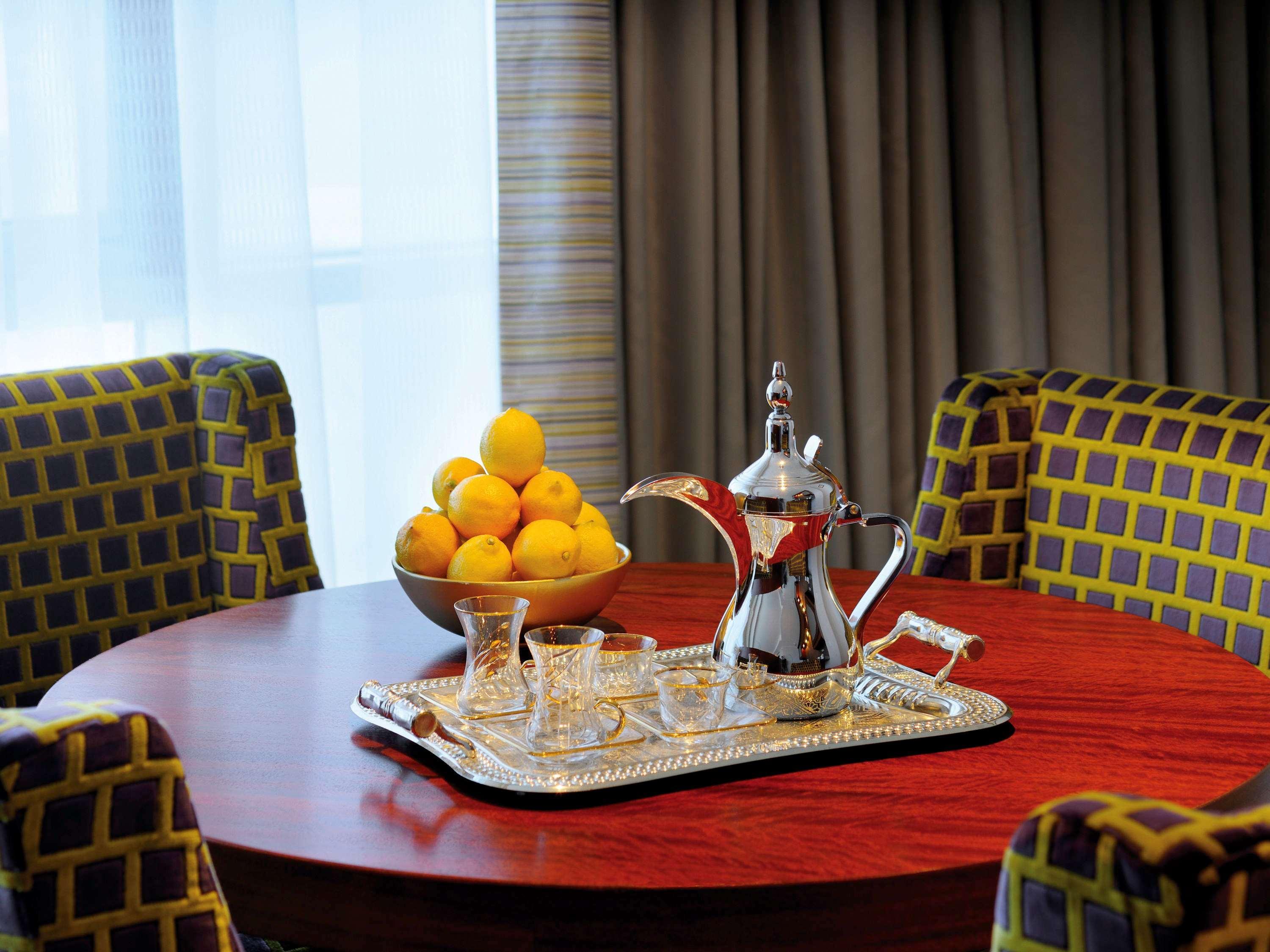 Qabila Westbay Hotel By Marriott Doha Bagian luar foto A traditional Arabic coffee pot